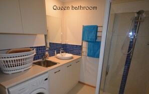 Hair dryer, slippers, towels, soap