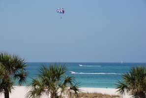 On the beach, sun-loungers, beach towels