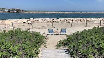 On the beach, sun loungers