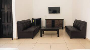 Exclusieve suite, meerdere bedden | Verduisterende gordijnen, geluiddichte muren, gratis wifi, beddengoed