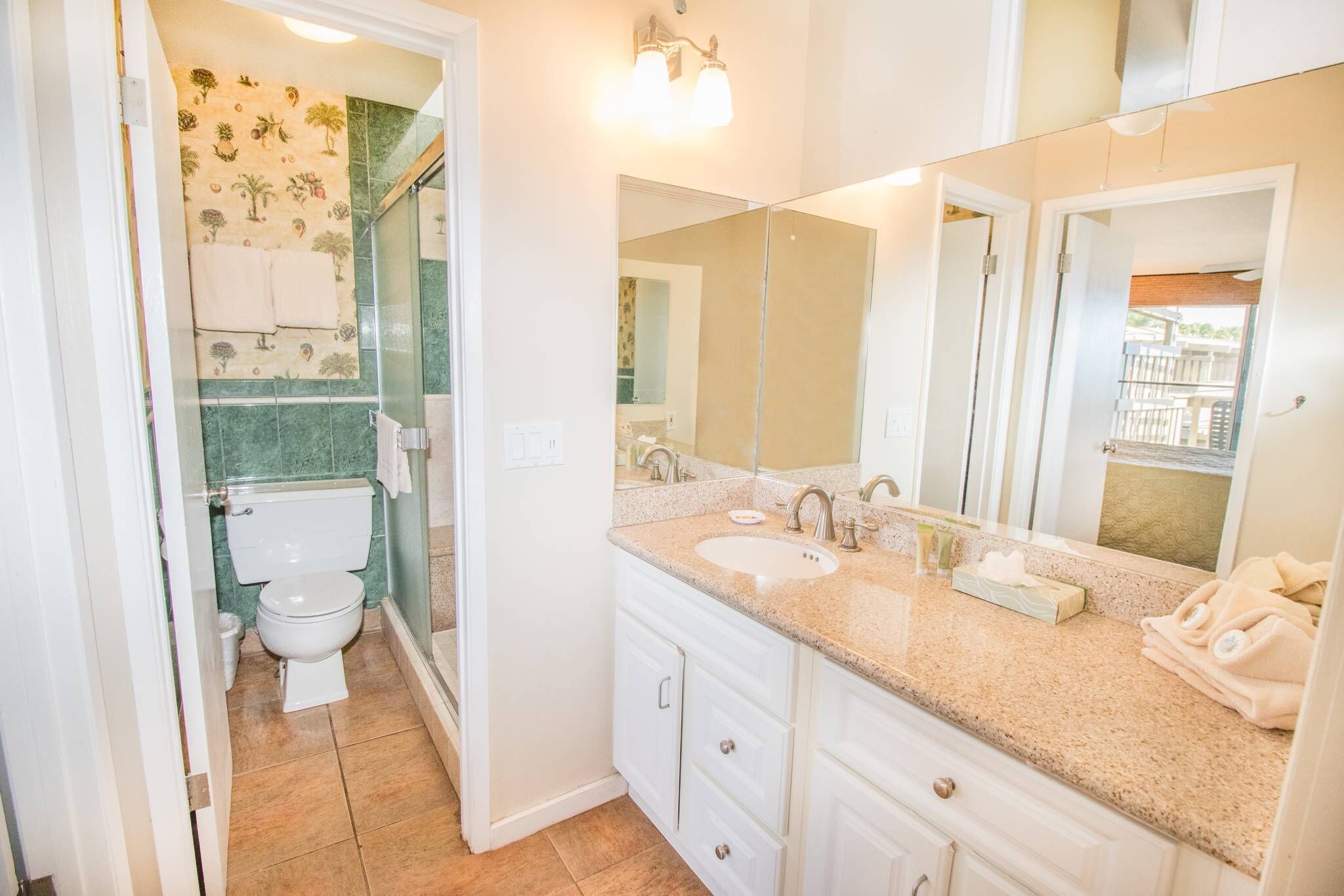 Combined shower/tub, hair dryer, towels, soap