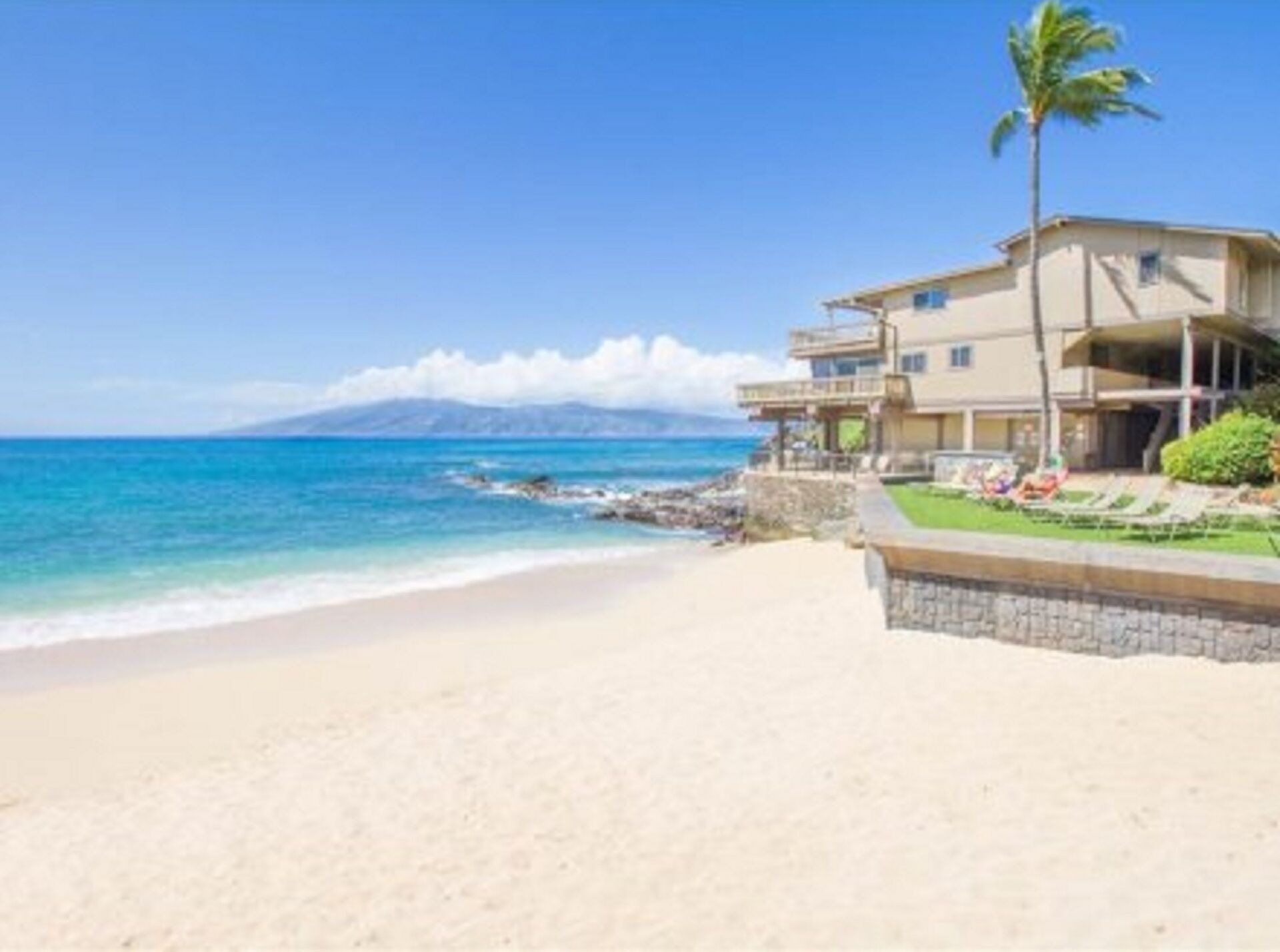 On the beach, sun loungers, beach towels