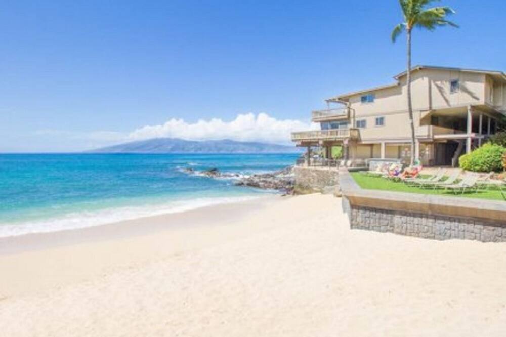 On the beach, sun loungers, beach towels