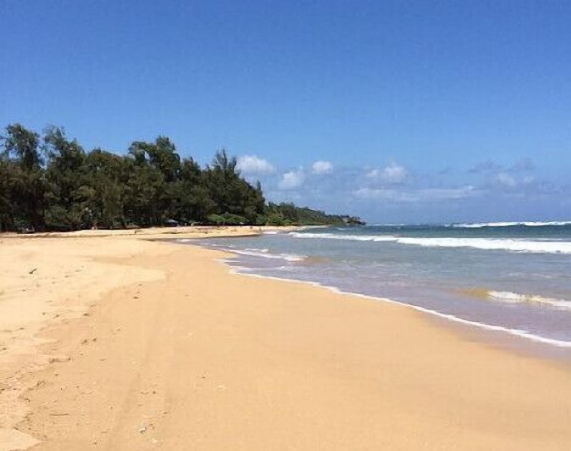 On the beach, sun loungers