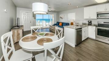 Suite, 1 Queen Bed, Non Smoking, Beach View | Living area | Flat-screen TV