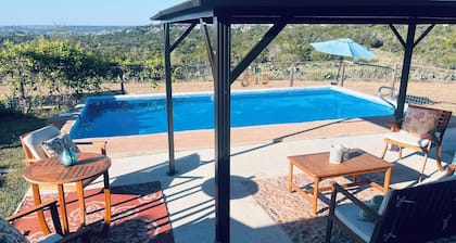 Beautiful view,18 acres,pool, game room,Axis deer, 3 mile’s to the river trail.