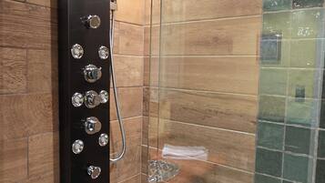 Combined shower/tub, hair dryer, towels, soap
