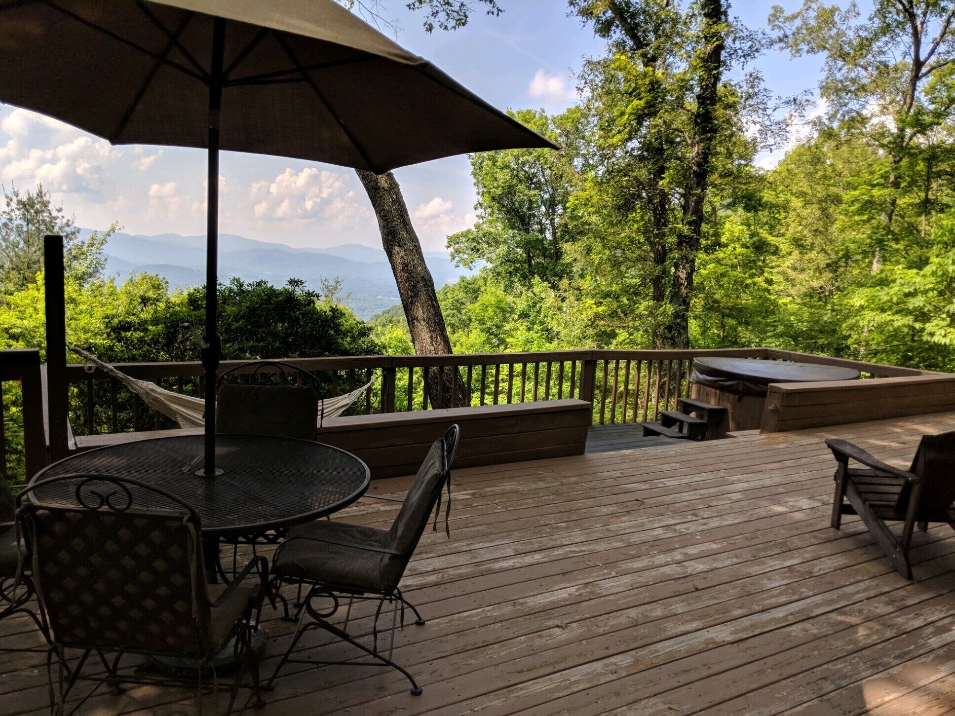 Spacious deck surrounds the home