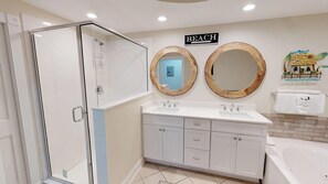 Shower, jetted tub, towels, soap