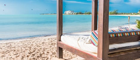 On the beach, sun loungers, beach towels