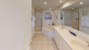 Combined shower/tub, jetted tub, towels, soap