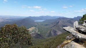 A mountainous landscape with a clear view of a valley and a lake. - Amaroo Retreat Halls Gap, Free unlimited WIFI... (Halls Gap)