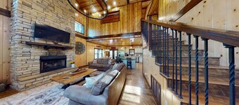Bring your ATVs and side by sides to this luxurious 4 bedroom cabin set deep in