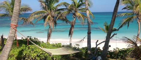 On the beach, sun loungers, beach towels