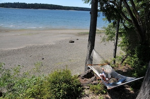 On the beach, sun loungers, beach towels