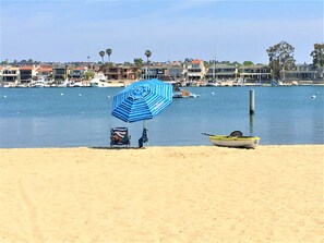 Enjoy a peaceful beach retreat with a clear view of the ocean and a rowboat for leisurely excursions.