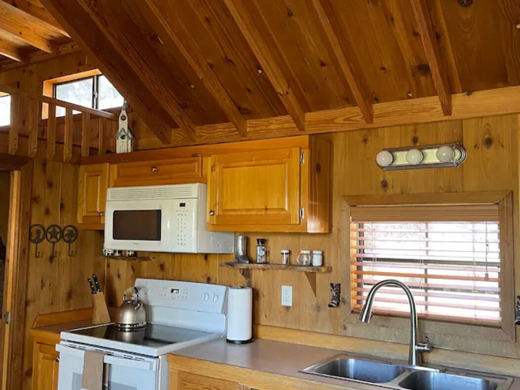 Fully equipped cabin for a weekend getaway with propane grill and hot tub
