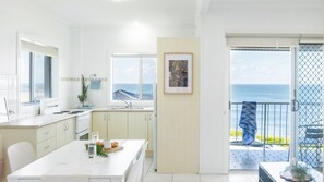 Fridge, microwave, oven, dining tables