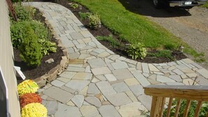 A stone pathway leading to a wooden deck with a railing. - Large Finger Lakes Getaway - 5 BR with Bath Access! (Naples)