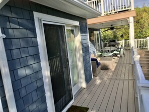 A deck with outdoor furniture and a covered area. - Montauk Beach House Walking Dist to Private Beach&Montauk Harbor Restaurants (Montauk)