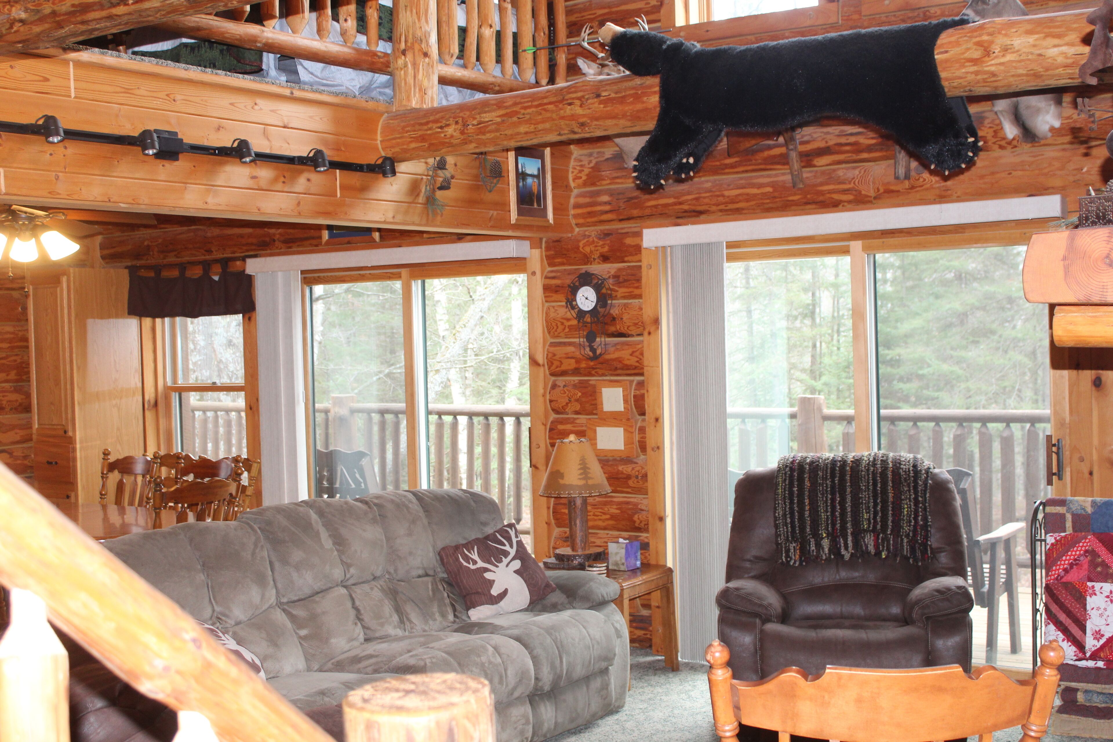 Year-round cabin, wooded riverfront on Lily River, WiFi, Central A/C, ATV Trails