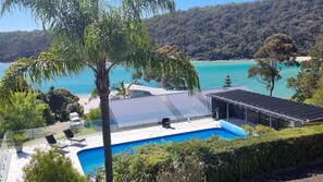 Outdoor pool, a heated pool - The Beach House; 11m private pool, spectacular beach views & direct beach access (Pambula Beach)