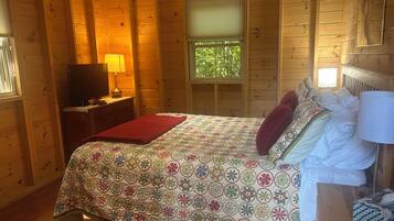 1 chambre, fer et planche à repasser, lit de bébé portatif