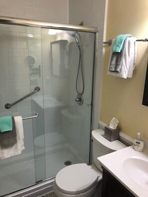 Shower, hair dryer, towels, toilet paper - Oceanfront! Topsail Dunes Beachfront Condo with Pool and Balcony (North Topsail Beach)
