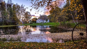 View of house looking north from swimming pond.