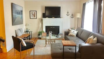 Smart TV, fireplace, books