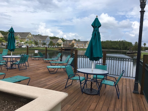Relax on the deck with comfortable seating areas and enjoy the serene views of the water.