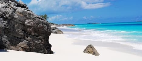 On the beach, sun loungers, beach towels