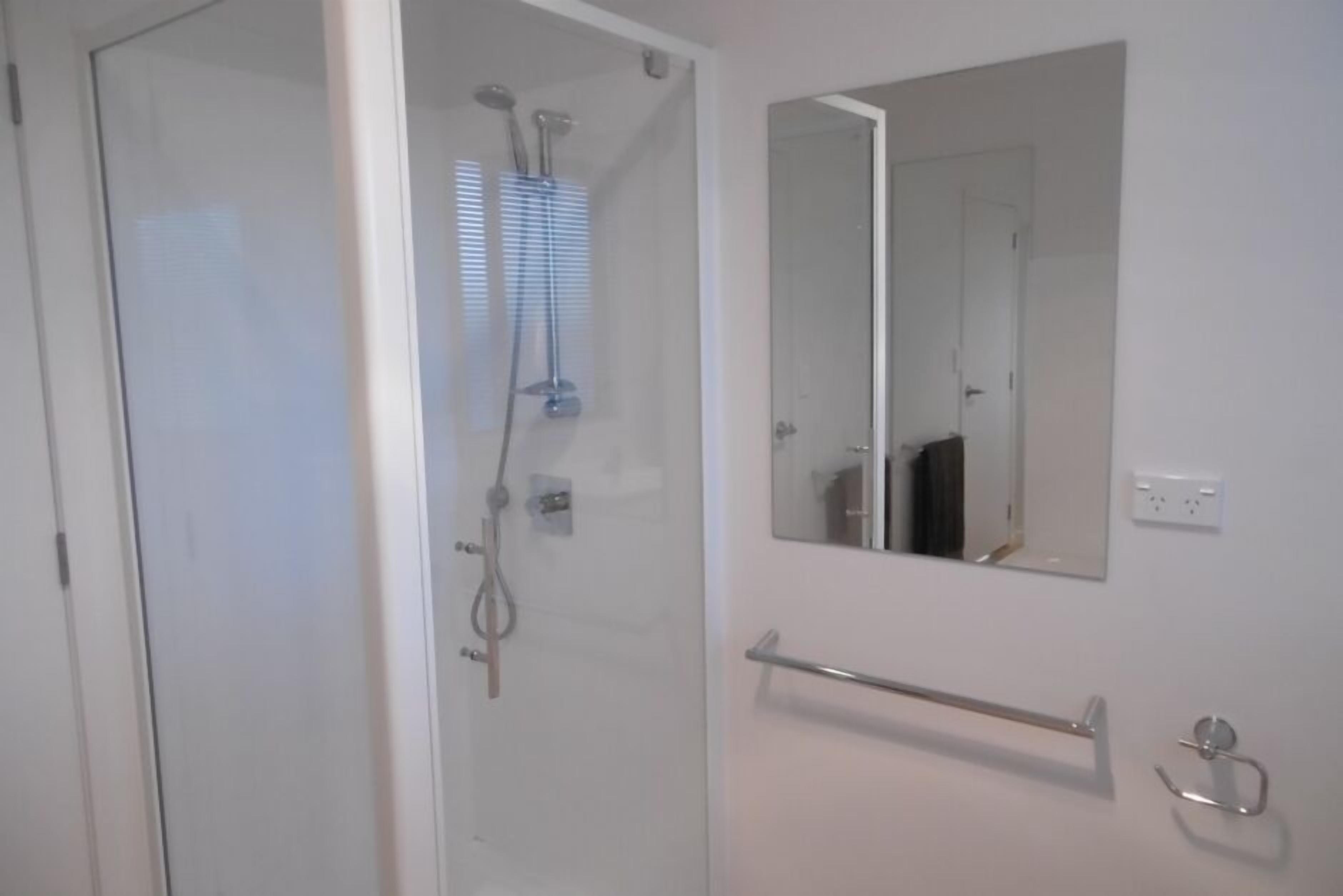 Bathtub, hair dryer, towels, soap