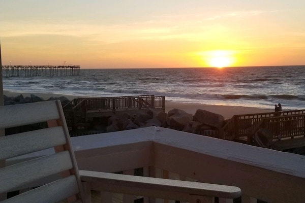 Welcome to your sunrise at The Pink Sunskipper, right on top of the beach