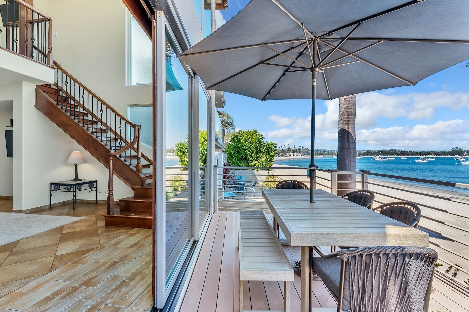 Wonderful beachfront home with pocket doors opening to the patio