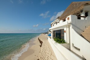 On the beach, sun-loungers, beach towels
