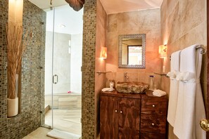 Combined shower/tub, hair dryer, towels, soap