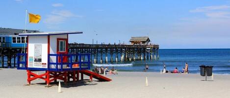 On the beach, sun-loungers, beach towels