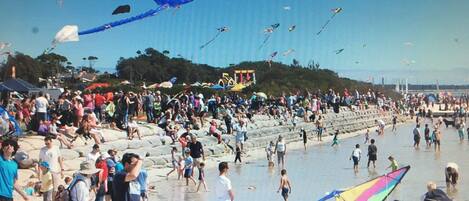 On the beach, sun-loungers