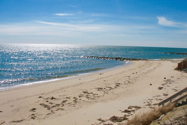 private beach on Nantucket Sound with sandy beach and warm shallow water