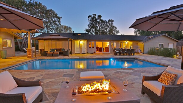 A backyard with a swimming pool, outdoor seating, and a fire pit. - Los Arboles Ranch - Recreational Dream Near Hope Ranch (Santa Barbara)