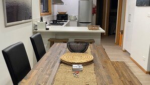 A modern kitchen with a dining area. - WOW! No better location.
Beachfront, private & tranquil. Unwind and reconnect... (Seymour)