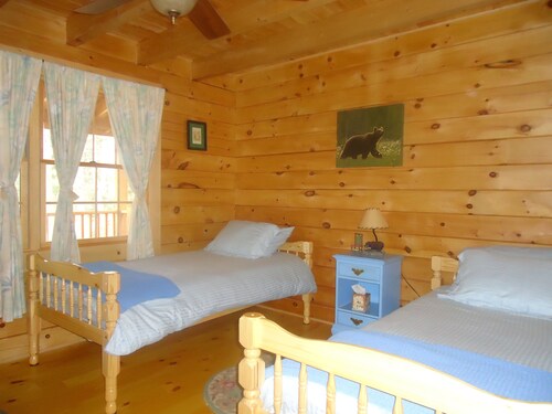 Charming log home, spacious yet cozy, nestled in the White Mountain region.