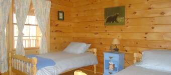 Charming log home, spacious yet cozy, nestled in the White Mountain region.