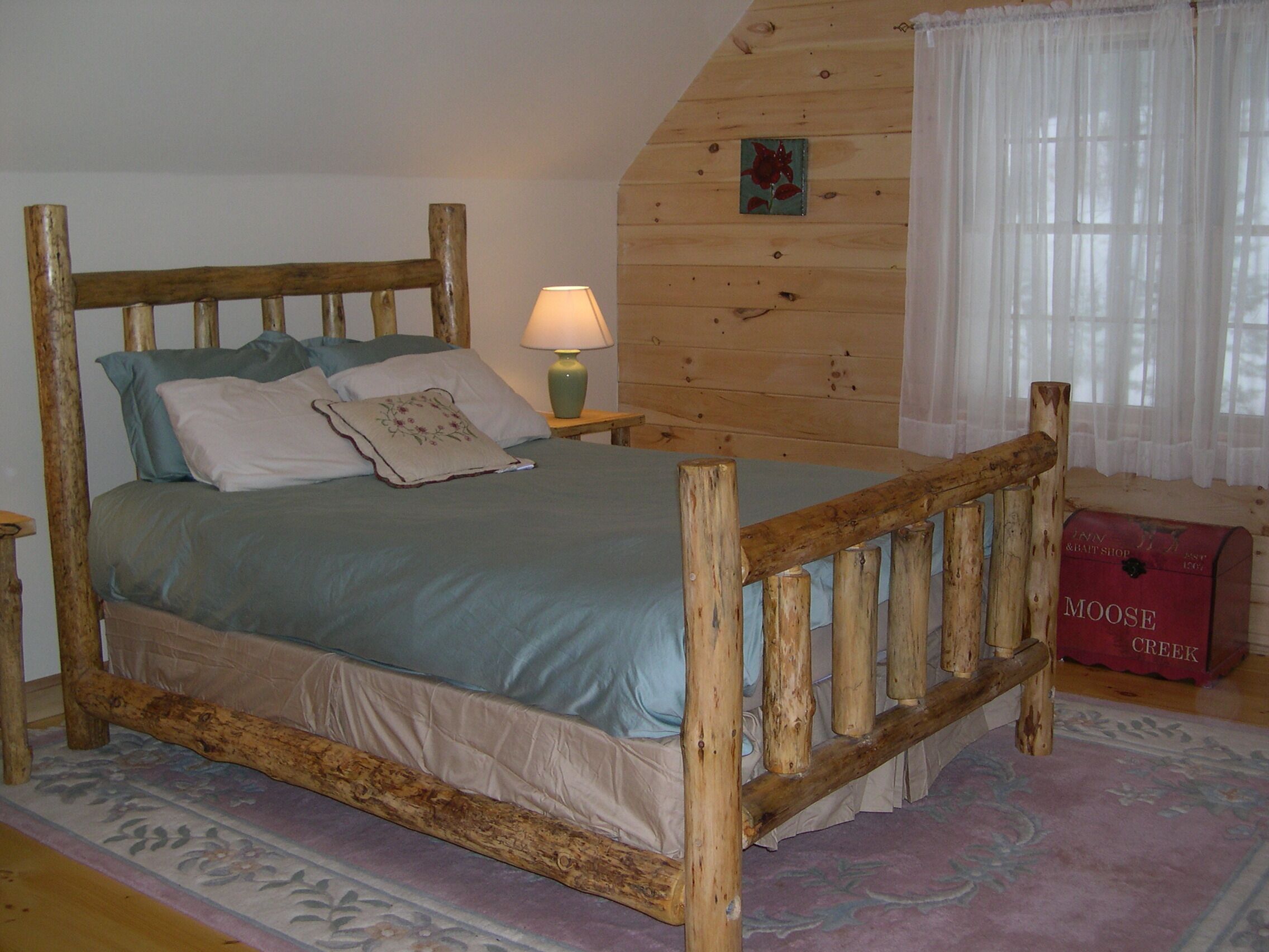 Charming log home, spacious yet cozy, nestled in the White Mountain region.