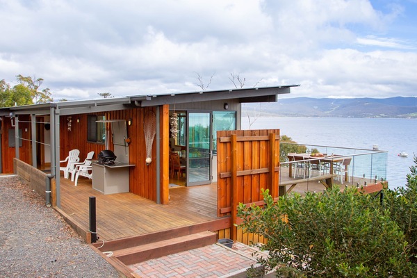 Large windows and wide verandas maximise the views