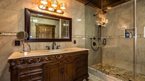 Combined shower/tub, hair dryer, towels, soap