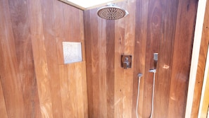 A wooden shower enclosure with a handheld showerhead and a wall-mounted control panel. - Paradise Found - Updated Classic 3 BR Home - Direct Oceanfront! (North Topsail Beach)