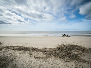 On the beach, sun-loungers