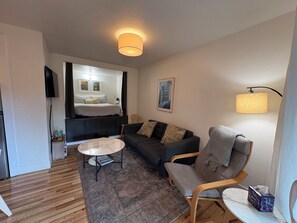 1 bedroom, desk, iron/ironing board, travel crib